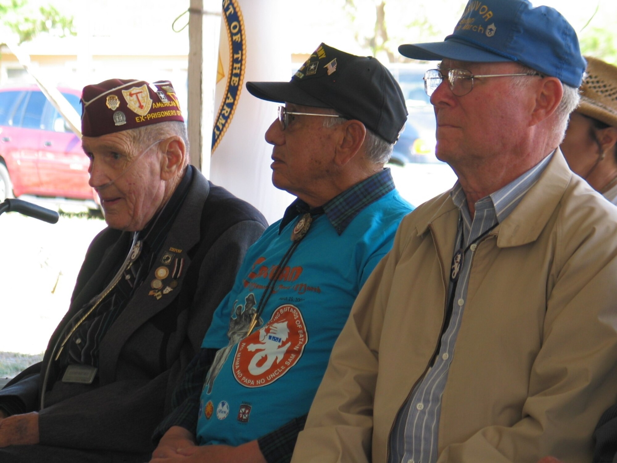 Chief Brown, along with other Bataan Death March survivors, watch the Bataan Death March Memorial closing ceremony at White Sands Missile Range, N.M. More than 4,000 people participated in the annual event held in honor of the servicemembers who defended the Phillippine Islands in 1942. (U.S. Air Force photo by Mr. Tommy Fuller)