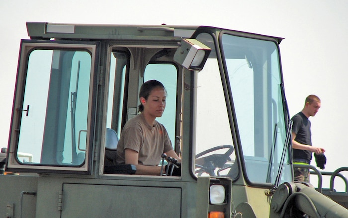 Staff Sgt. Ashley Lane, 53rd Aerial Port Squadron air transportation journeyman, delivers cargo to the aerial port staging area during the Patriot Partner Exercises. (U.S. Air Force photo by Chief Master Sgt. Wayne Hall)