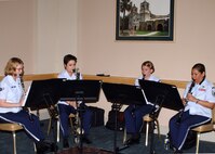 The Band of the West's clarinet quartet provides musical entertainment to those attending the Air Force Assistance Fund campaign commencement luncheon March 23 at the Gateway Club on Lackland Air Force Base, Texas. The campaign began March 21 and runs through May 2. (USAF photo by Sid Luna)                           