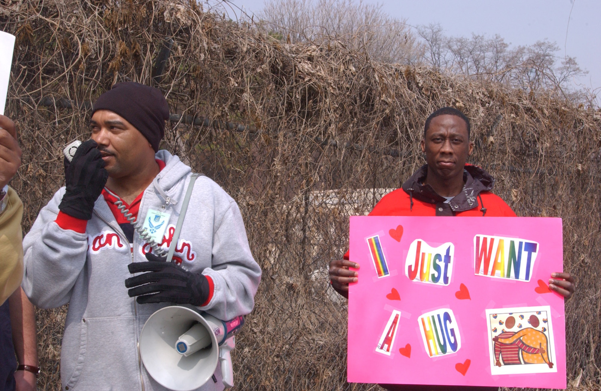 (OSAN AIR BASE, Republic of Korea --  Staff Sgt. Robert L. Henderson pretends to be a protester outside the main gate Monday during the most recent exercise here. (U.S. Air Force photo by Staff Sgt. Christopher Marasky)