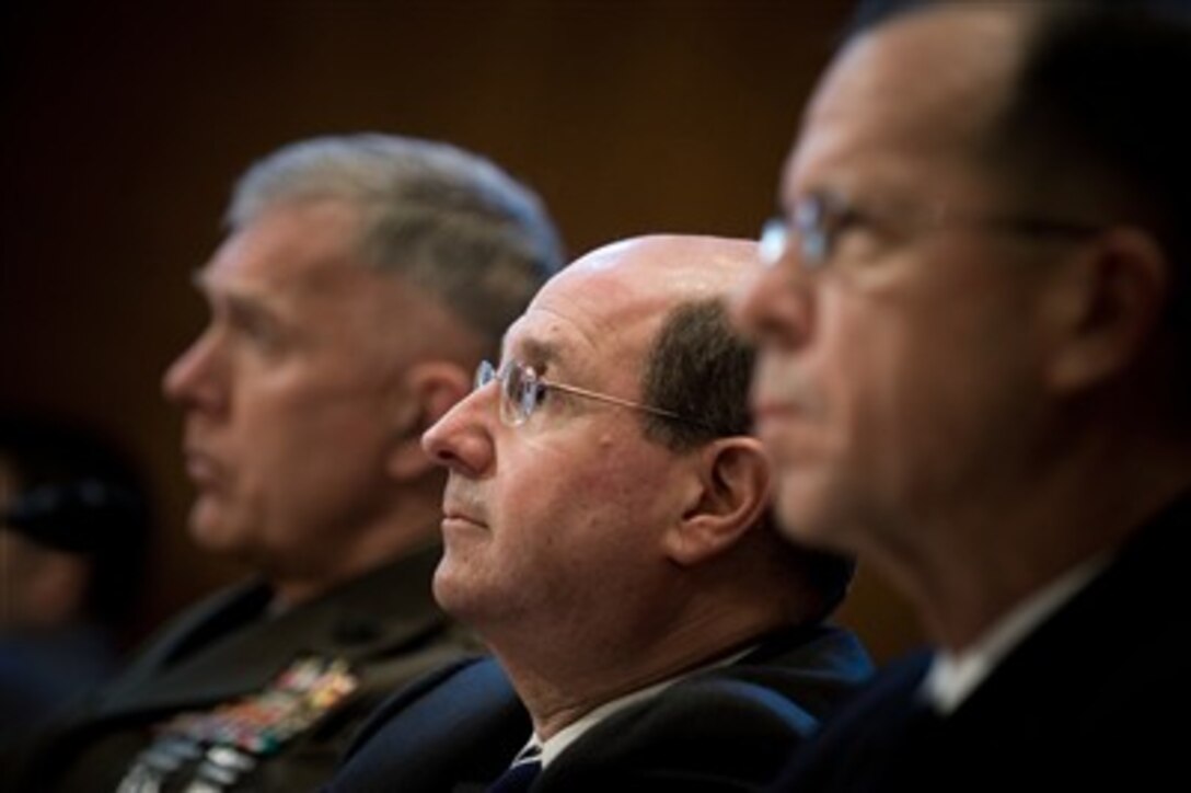 Secretary of the Navy Donald C. Winter (center) is joined by Commandant of the Marine Corps Gen. James T. Conway and Chief of Naval Operations Adm. Mike Mullen during testimony before the Senate Appropriations Committee on the 2008 National Defense Budget Request in Washington, March 28, 2007.