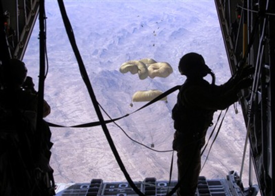 A loadmaster secures a C-130 Hercules ramp after dropping critical supplies to replenish U.S. ground forces in Afghanistan in support of Operation Enduring Freedom March 27, 2007. 