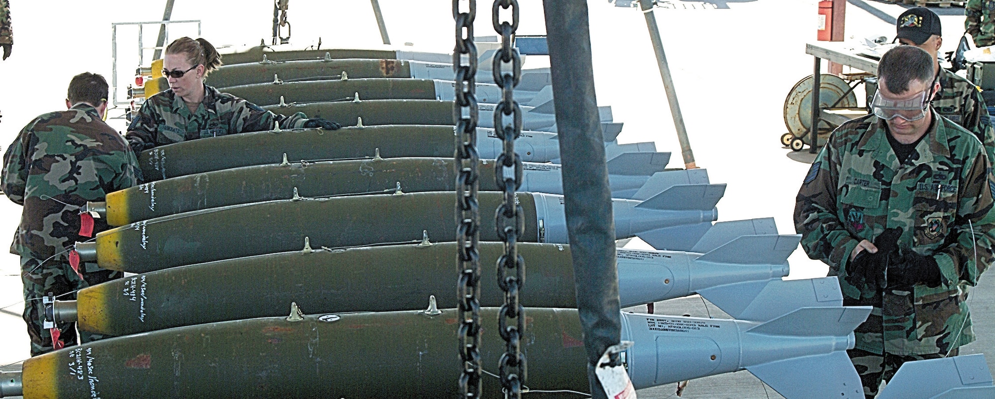 In Davis-Monthan Air Force Base's munitions storage area, and far from the noise and activity of the flightline, 442nd Maintenance Squadron munitions troops busily build 500-pound bombs for the Wing's pilots to drop at western Arizona's Barry M. Goldwater Range near Gila Bend. (U.S. Air Force photo/Master Sgt. William Huntington)