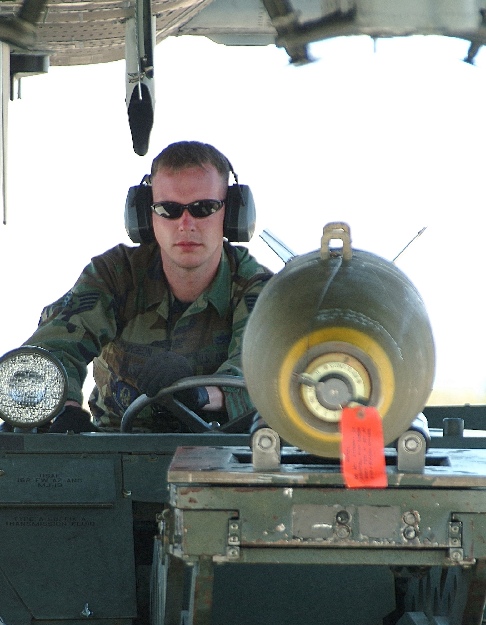 Staff Sgt. Stephen Spurgeon, 442nd Aircraft Maintenance Squadron, drives a jammer with a 500-pound bomb for loading on an A-10 at Davis Monthan AFB, Ariz., during the wing's "Patriot Rattlesnake" deployment.  Reservists from the 442nd deployed to Arizona from Whiteman Air Force Base, Mo., to practice employing live munitions on the Barry M. Goldwater Range.  (US Air Force photo/Master Sgt. Bill Huntington)