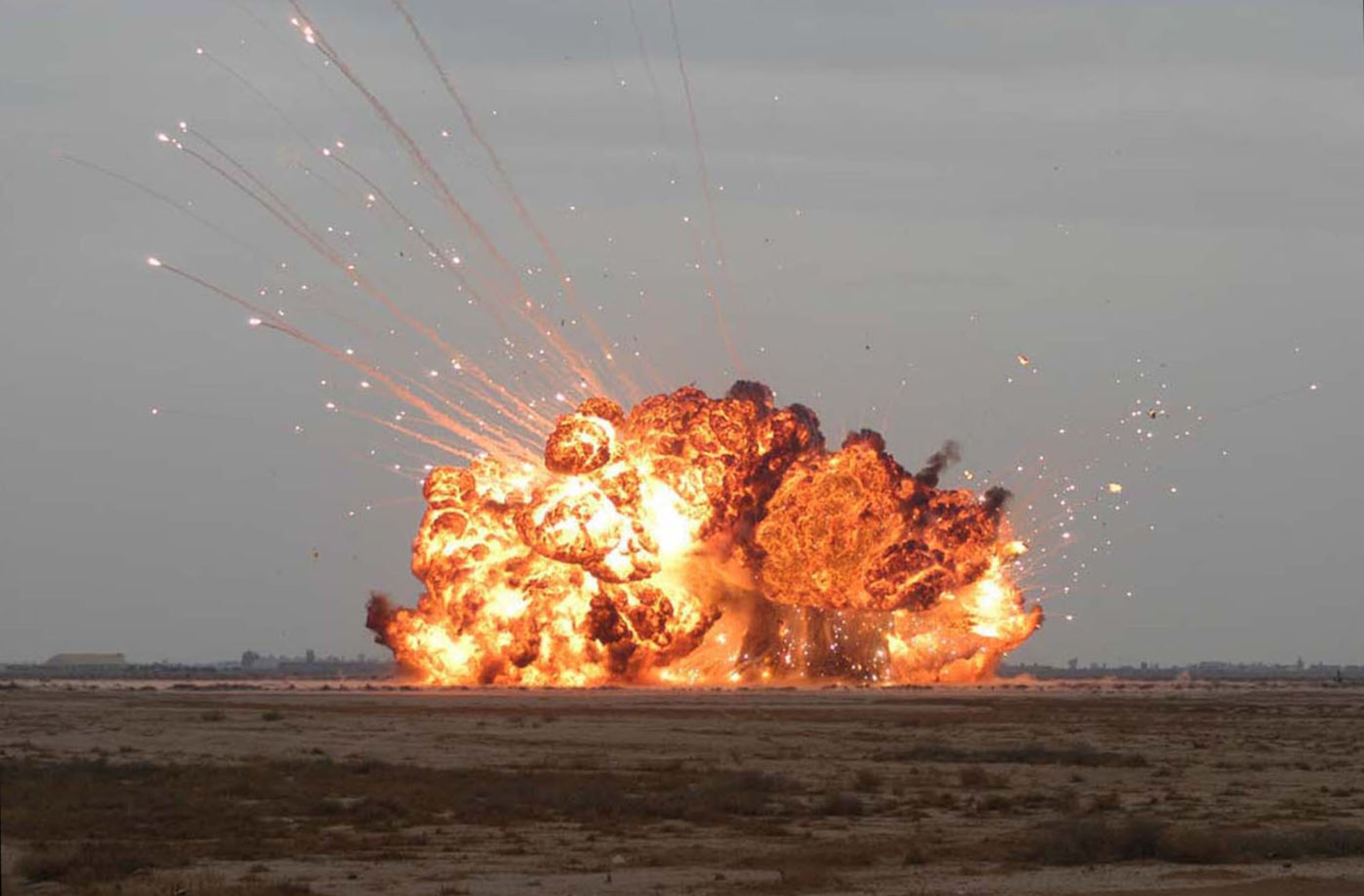 BALAD AIR BASE, Iraq -- A controlled detonation eliminates unexploded ordnance found in the area.  Airmen of the 332nd Expeditionary Civil Engineer Squadron explosive ordnance disposal unit destroy items weekly.  (U.S. Air Force photo)