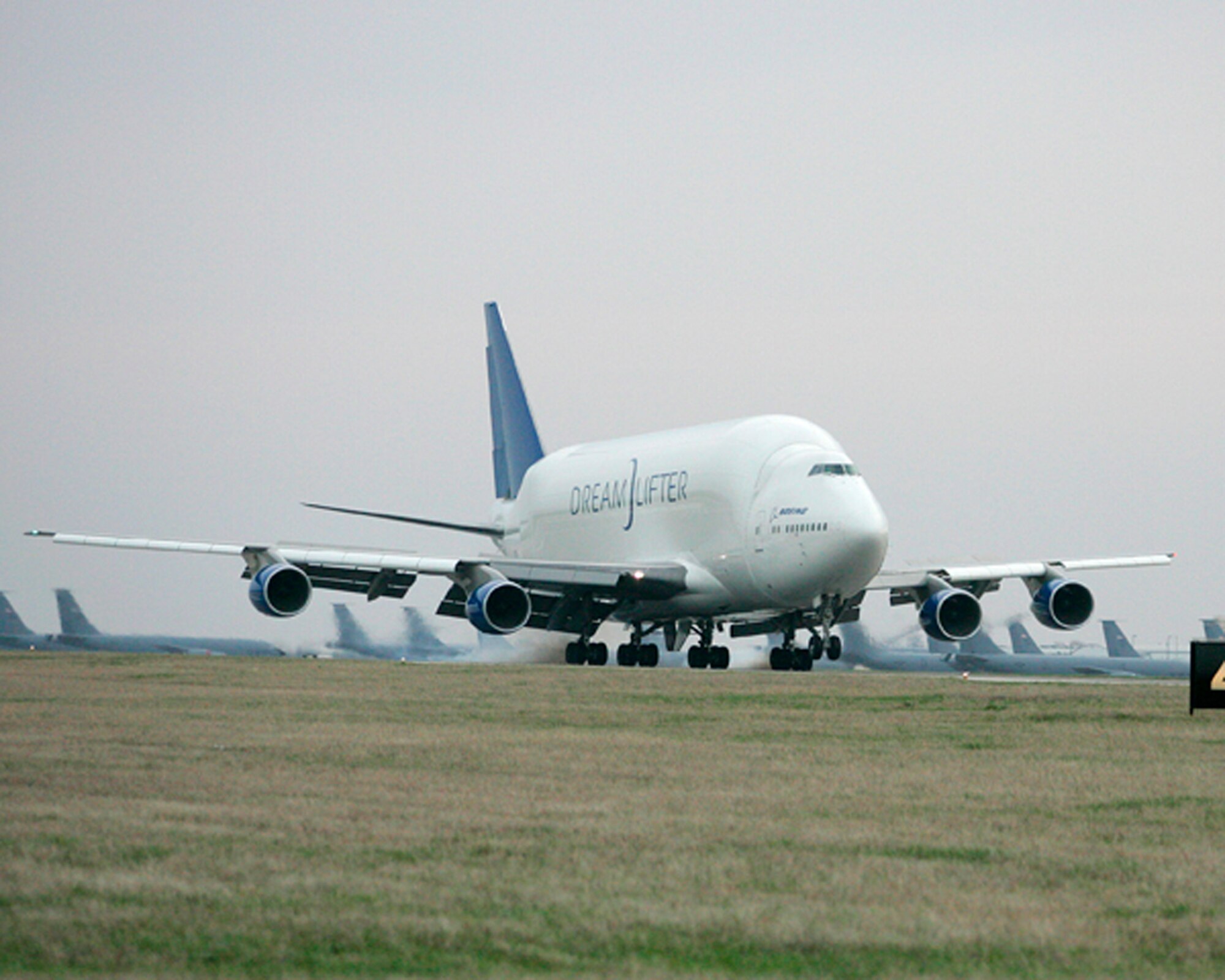 A modified Boeing 747 freighter arrives at the Boeing facility at McConnell March 24. The Dreamlifter has a wingspan of more than 211 feet. It is in Wichita for maintenance and will be used to transport 787 parts from Boeing suppliers around the world. (Photo by Fred Solis)