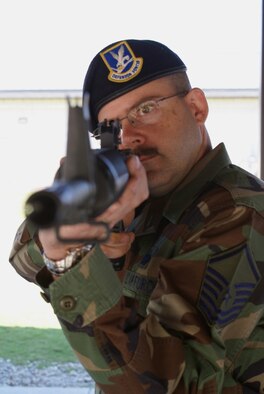 Master Sgt. Stephen Hodges, 482nd Security Forces Squadron, placed 11th out of 190 Airmen at the Elementary Excellence in Competition Rifle Match at Wright-Patterson A.F.B, Ohio. His score of 449 put him in the top ten percent, earning the bronze EIC Rifle Match medal. (U.S. Air Force photo/Dan Galindo)