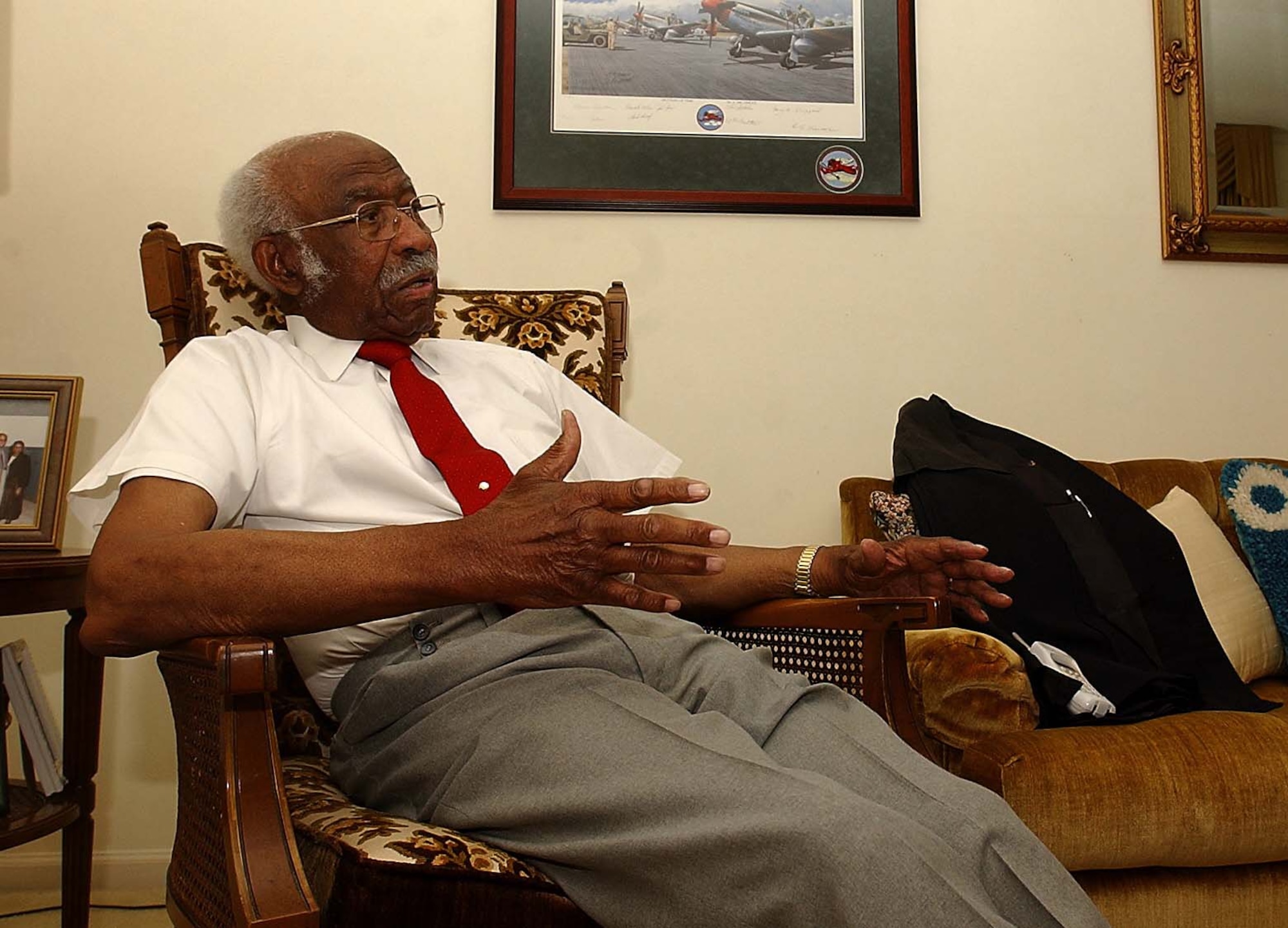 Leroy Bowman sits in his living room and talks about his time as a member of the historic and groundbreaking Tuskegee Airmen, March 27.
Mr. Bowman, along with his fellow Tuskegee Airmen, was presented the Congressional Gold Medal in Washington D.C. March 29.  
Mr. Bowman is a Sumter, S.C. native and a friend to Shaw Air Force Base. The Tuskegee Airmen join the ranks of other esteemed recipients such as President George Washington, Pope John Paul II and Sir Winston Churchill.  (Photo by Chris Moore/The Item)
