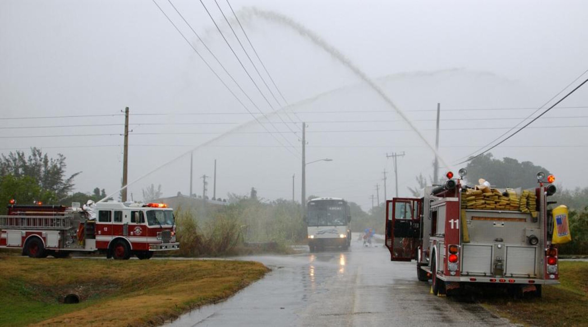 Twenty-one soldiers of the 930th Army Liaison Team, a tenant unit of Homestead Air Reserve Base, return to a hero’s welcome, partly provided by the 482nd Civil Engineering Squadron Fire Department March 22. The unit was deployed for a year to Afghanistan. (U.S. Air Force photo/Dan Galindo)