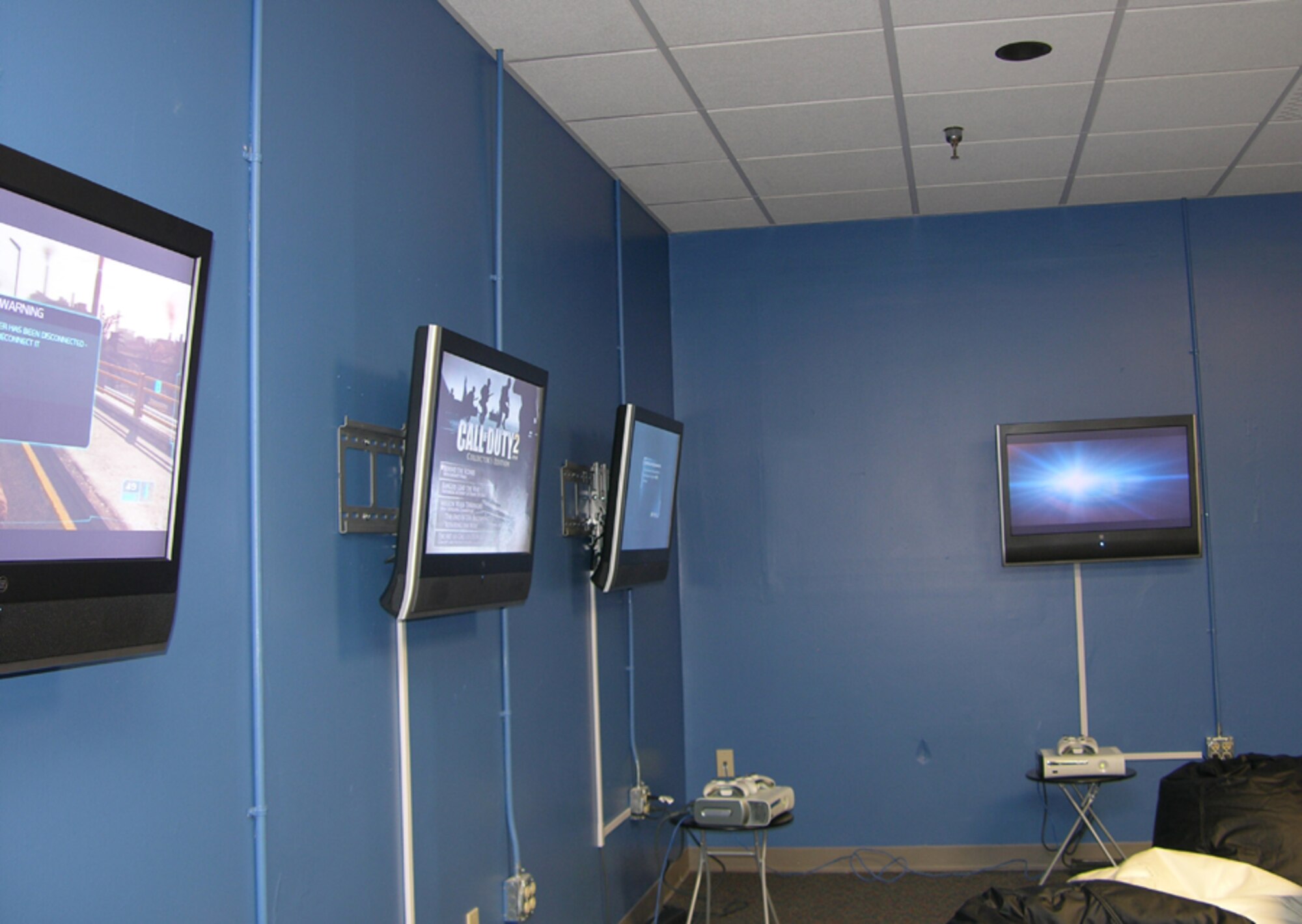 One of the features of The Landing Zone is a high-tech game room, complete with computers and game machines. (U.S. Air Force photo by Jon Ortiz)