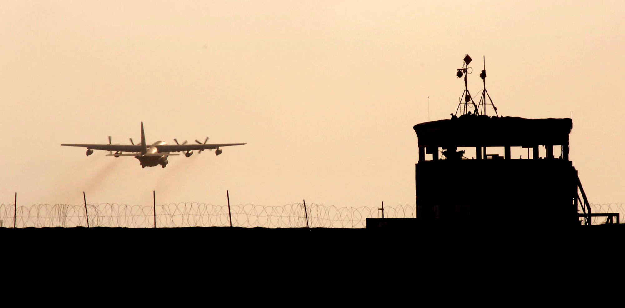 An HC-130P takes off from Camp Lemonier headed down range in support of the Combined Joint Task Force-Horn of Africa mission. More than 1,500 men and women from all branches of service as well as civilians and coalition forces provide medical, humanitarian and nation-building efforts in Djibouti, Ethiopia, Eritrea, Kenya, Seychelles, Somalia, Sudan and Yemen. (U.S. Air Force photo/Daren Reehl) 