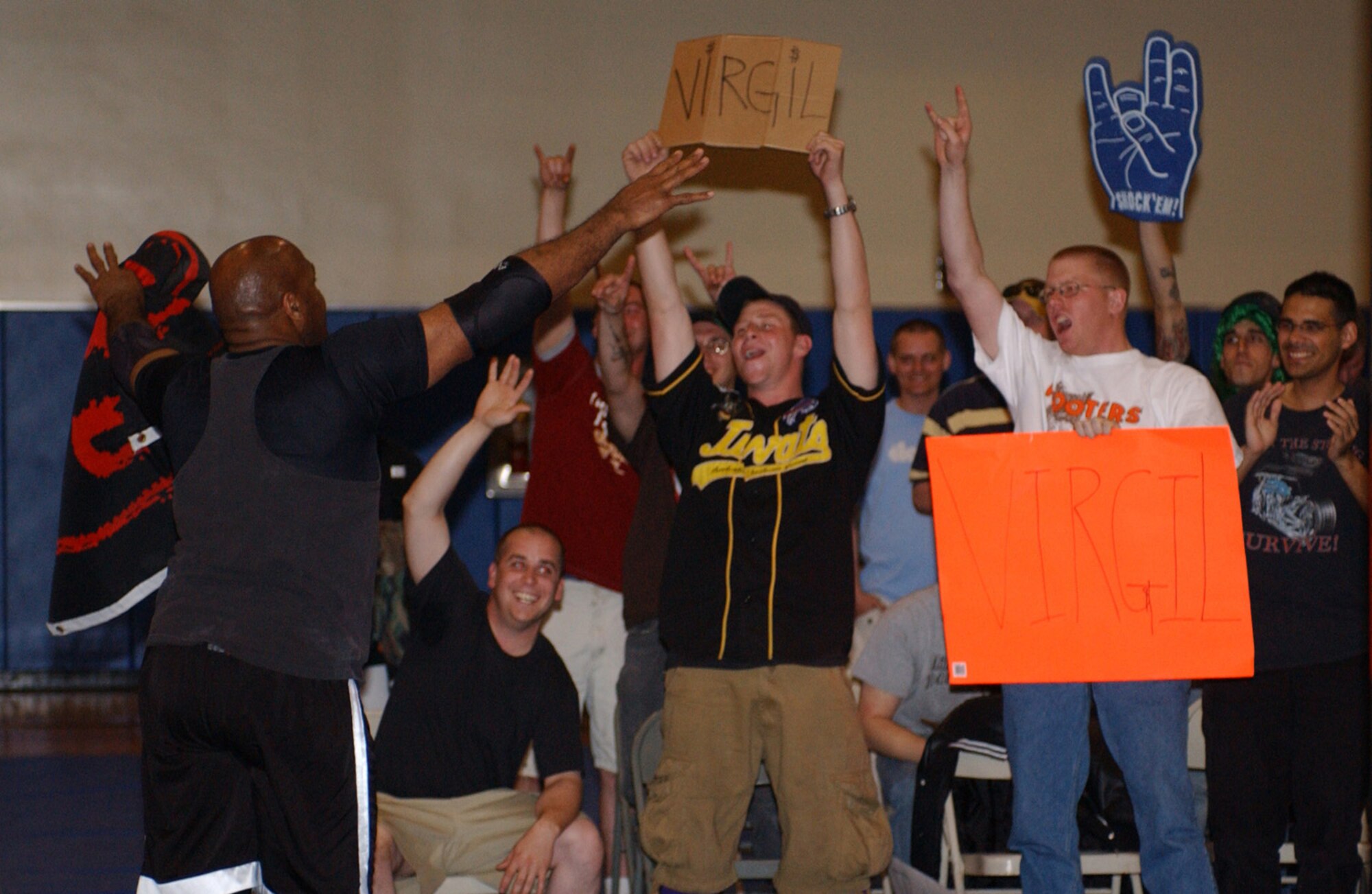 KUNSAN AIR BASE, Republic of Korea  April 29, 2007 -- International Championship Wrestling and New World Order wrestler Virgil greets his fans before his heavyweight bout April 29 at the base fitness and sports center. Virgil is part of the ICW's 2007 Pacific Invasion tour, sponsored by Armed Forces Entertainment, which took the wrestling group to other United States Forces Korea installations, including Chinhae Naval Base, Camp Humphries, Osan Air Base and Camp Red Cloud. The wrestling tour ran from April 12 through May 1.                                                              