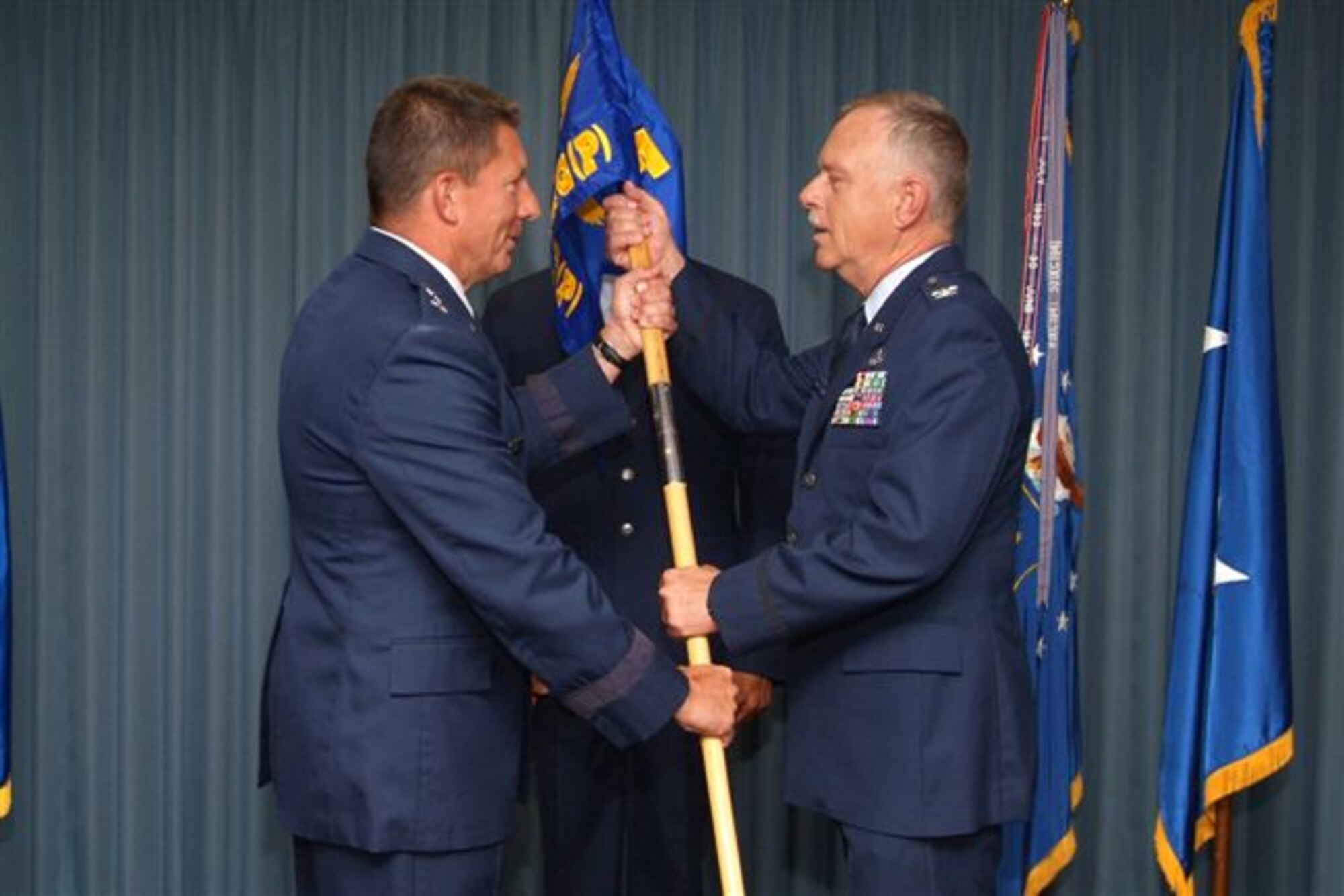 Col. Mark McClelland, commander 602nd provisional Training Group receives the 602nd TRG-P guidon from Maj. Gen. Mike Gould, 2nd Air Force commander.  The 602nd TRG-P was activated with Colonel McClelland as commander April 27.  (U. S. Air Force photo by Adam Bond)
