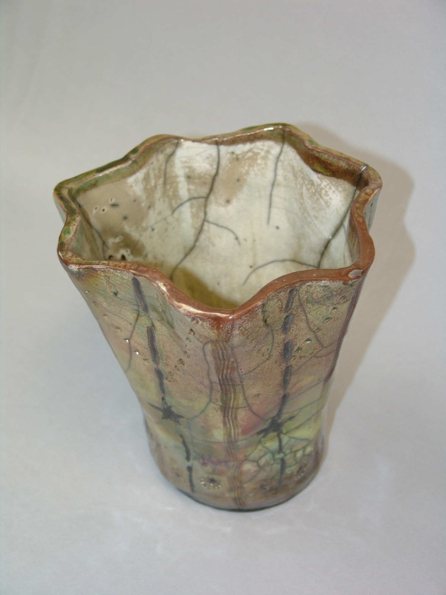 This ceramic artwork made by Eugene L. Rybicki entitled "Raku Vase" was chosen to be showcased in the Air Force Services Arts and Crafts exhibit gallery on the Web. The Web site, www.af-artscrafts.com, is a resource for arts and crafts customers to find information on local base centers as well as tips for creative projects and auto hobby.  (Courtesy photo)