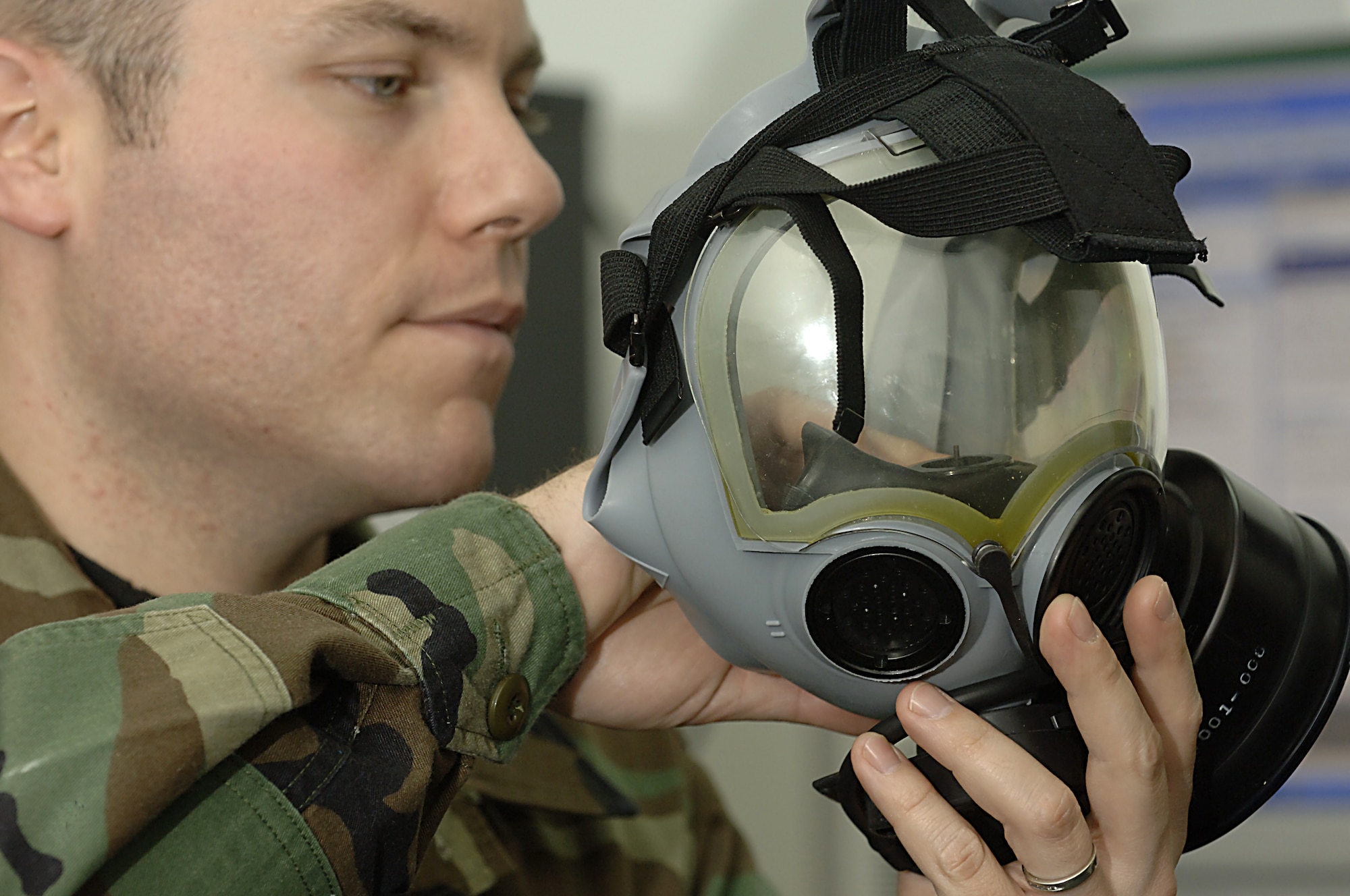 Staff Sgt. Jeff Nevison, 39th Communications Squadron, inspects his gas mask on May 1.  This is just on of many things that members of Team Incirlik are doing to prepare for the Unit Compliance Inspection.  (U. S. Air Force photo by Airman 1st Class Nathan W. Lipscomb)