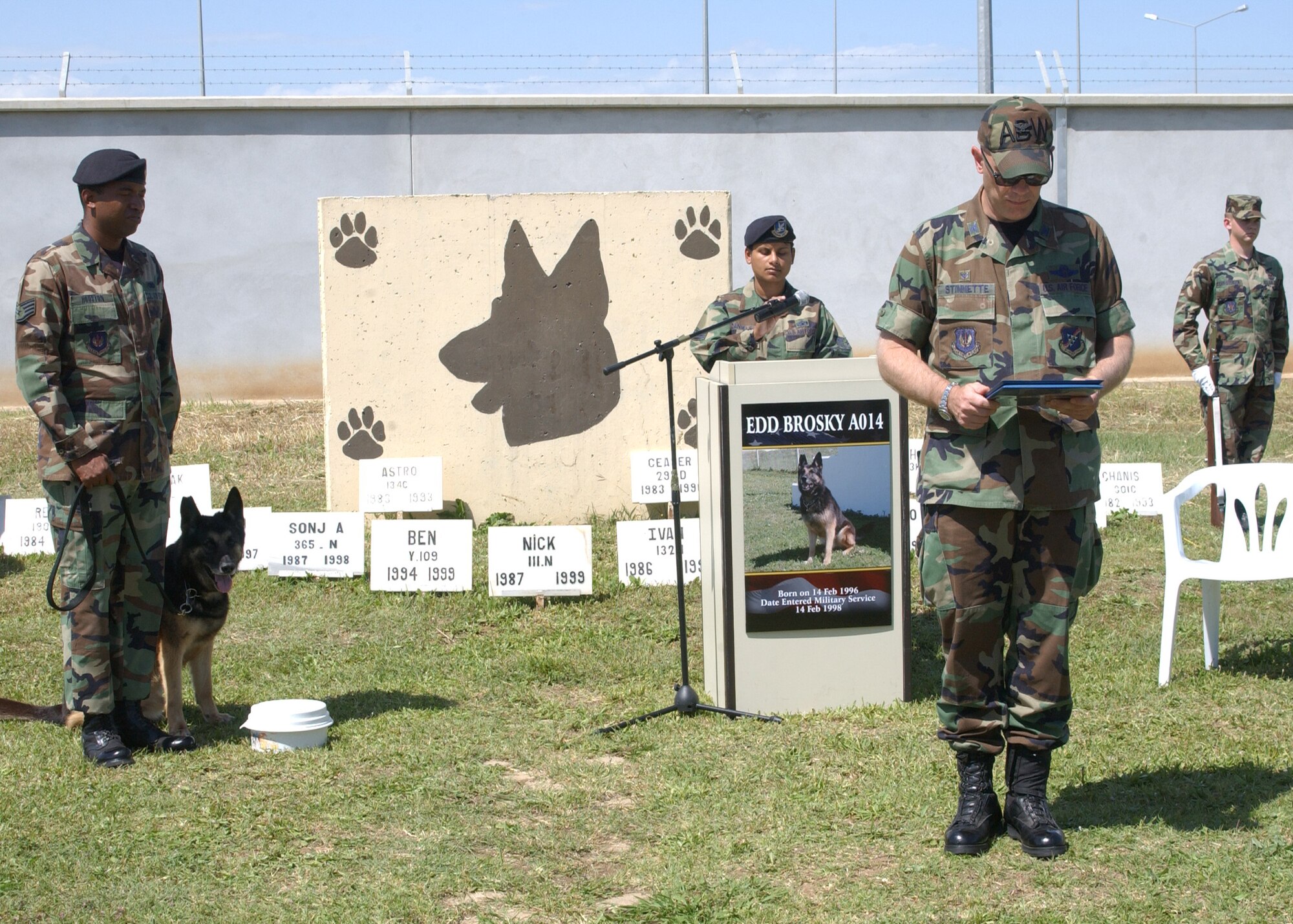 Col. "Tip" Stinnette, 39th Air Base Wing commander, reads the Certificate of Retirement during Brosky A014's Retirment Ceremony on April 27. Brosky has been part of Team Incirlik for the past nine years as a patrol/explosive detection military working dog.  (U.S. Air Force photo by Airman 1st Class Tiffany Colburn)                              