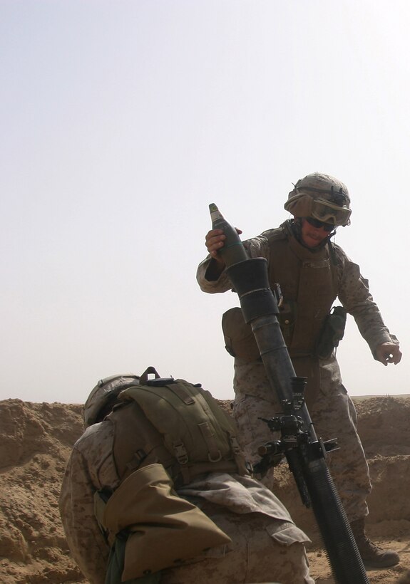 Marines from 81mm Mortar Platoon, Battalion Landing Team 2/2, 26th Marine Expeditioanry Unit, fire mortars during live-fire training at Udairi Range, Kuwait, May 2, 2007.  (Official USMC photo by Cpl. Jeremy Ross) (Released)