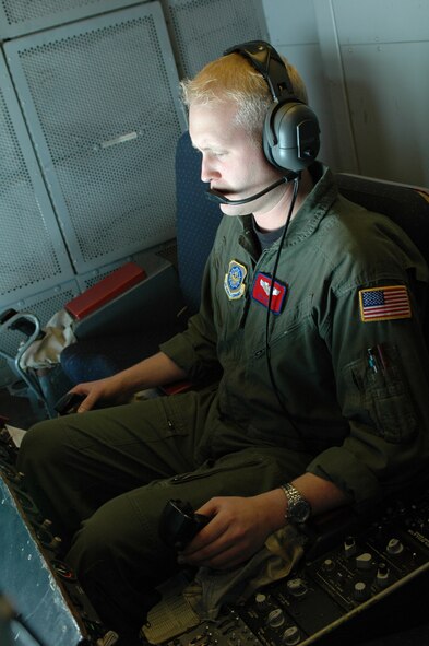 Senior Airman Tim Lienz, 9th Air Refueling Squadron, refuels a B-2 Bomber during a training flight April 26. (U.S. Air Force photo by Tech. Sgt. Donald Osborn)