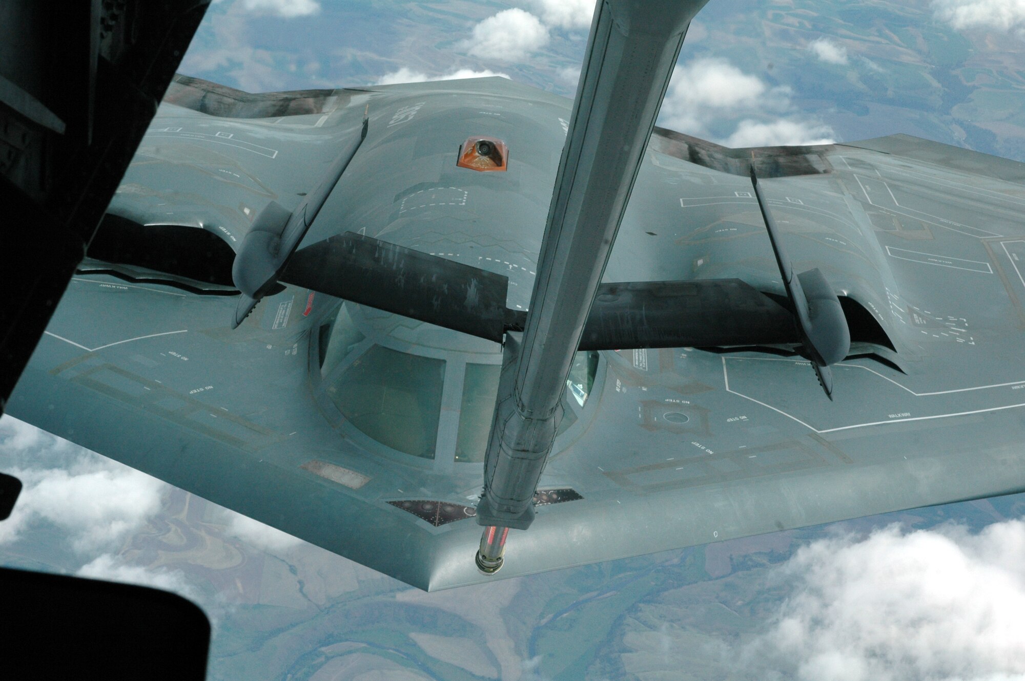 A Travis KC-10 Extender, flown by members of the 9th Air Refueling Squadron, refuels a B-2 Spirit Stealth Bomber during a training flight April 26. (U.S. Air Force photo by Tech. Sgt. Donald Osborn)
