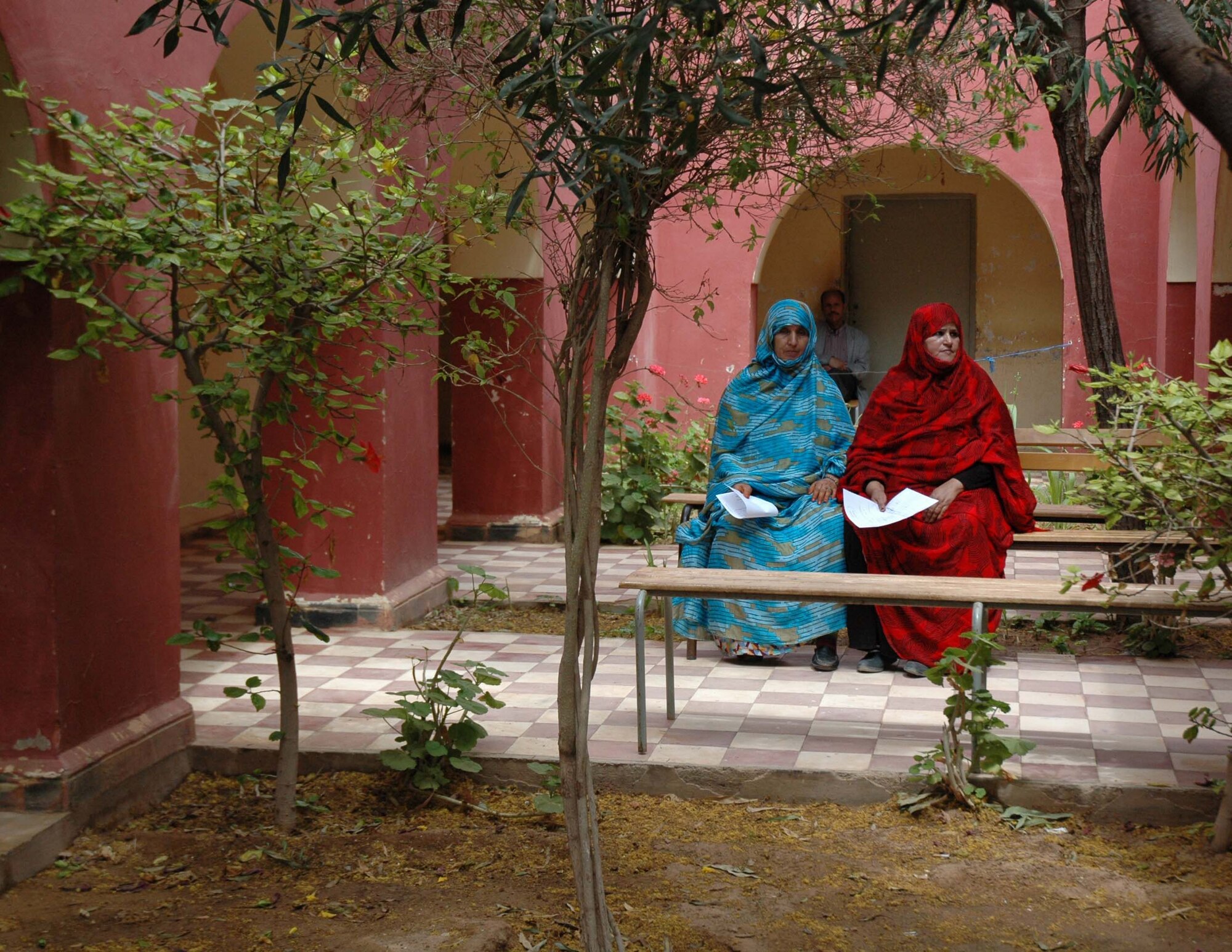 Two women from the village of Asrir, Morocco, wait to be seen April 23, by Moroccan and American doctors as part of exercise African Lion 2007. The 944th Medical Squadron team of 37 saw 3,746 patients in six days. (U.S. Air Force photo/Tech. Sgt. Susan Stout)