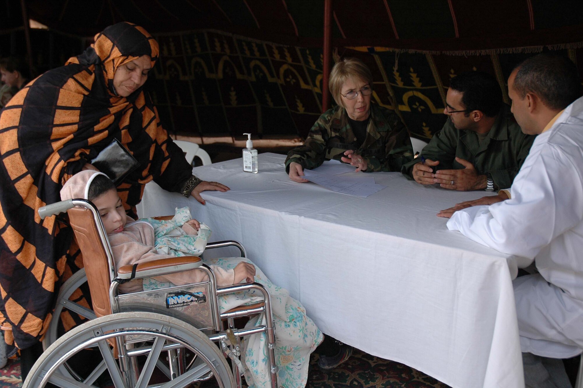 Patients are triaged April 19, 2007, at the village of Bouizakarne, Morocco, on the first day of the humanitarian portion of exercise African Lion. The 944th Medical Squadron and their integrated team with the host nation of Morocco provided medical and dental care to almost 3,800 villagers over six days. (U.S. Air Force photo/Tech. Sgt. Susan Stout)