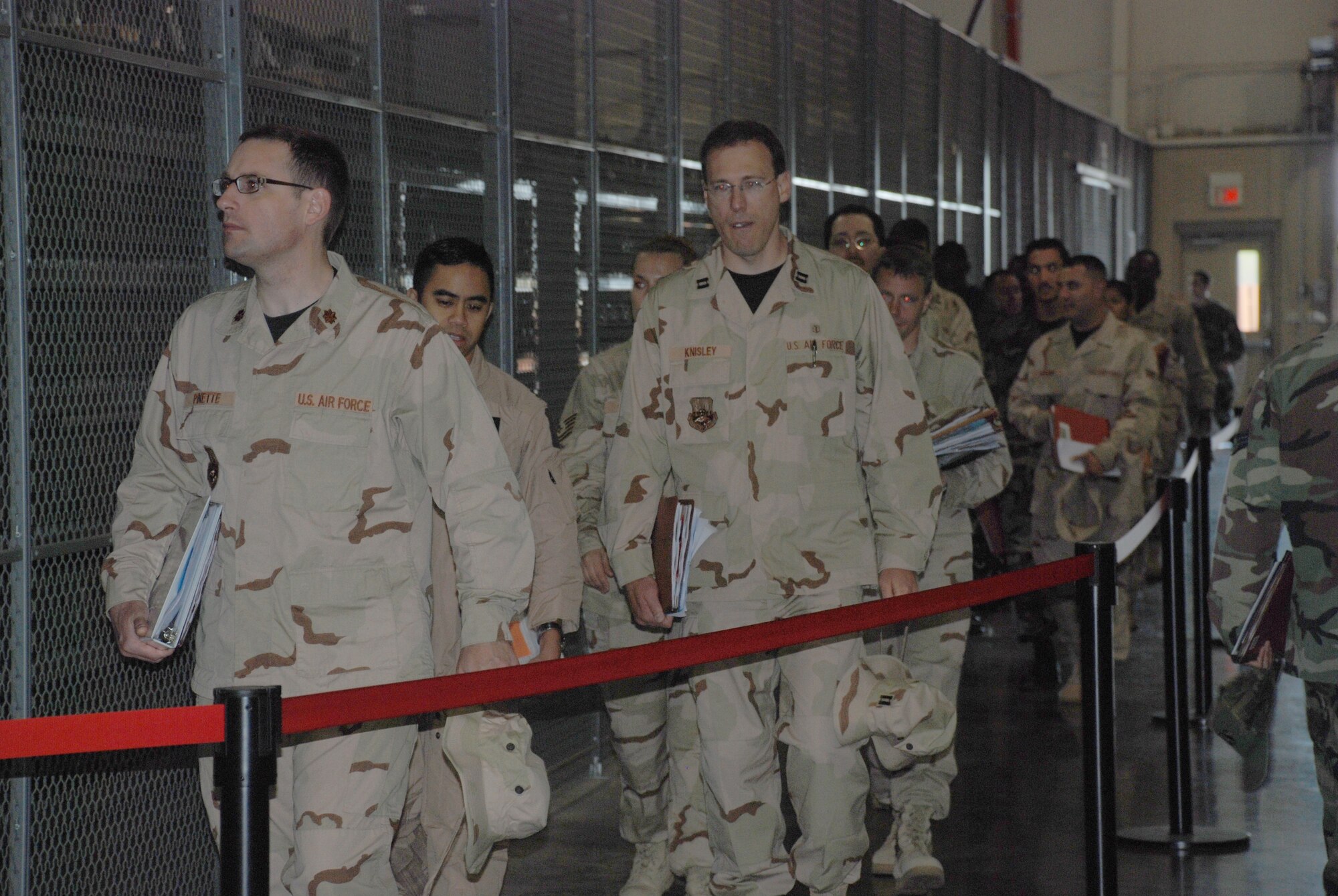 Team Sheppard members assemble and prepare to go through the mobility line May 2. Team Sheppard is preparing to deploy over 100 Airmen to locations around the globe in support of the global war on terrorism. (U.S. Air Force photo/Airman 1st Class Jacob Corbin)