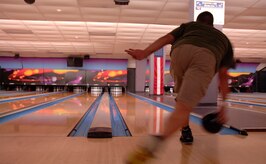 Staff Sgt. Josh Chambliss enjoys bowling at the recently renivated Starlifter Lanes.  The grand reopening of Starlifter Lanes will be held May 10 at 9 am.(U.S. Air Force photo/ Staff Sgt. April Quintanilla)