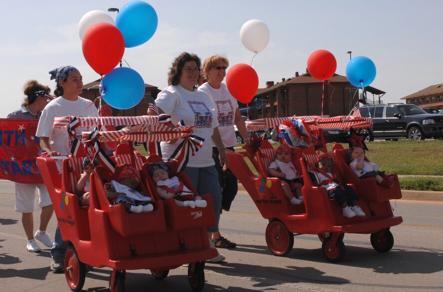 In honor of the Month of Military Child, Dyess' Child Development Center sponsored a parade involving dependant children, parents and employees from the center April 27. The parade is one of many events hosted annually by the CDC during the month of April. (U.S. Air Force photo by Senior Airman Courtney Garrard)