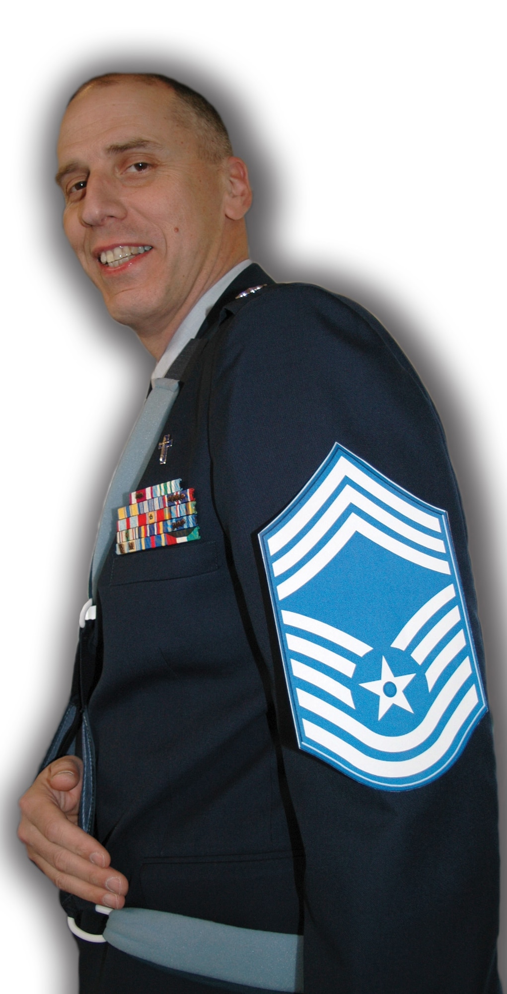 The Air Force Reserve's 512th Airlift Wing Chief's Group inducted Chaplain (Lt. Col.) John Groth as an honorary chief in a ceremony at the Landings April 14. He is the second Liberty Wing officer in 30 years to be inducted as an honorary chief here. (U.S. Air Force photo/1st Lt. Marnee A.C. Losurdo; Illustration/Tech. Sgt. Veronica A. Aceveda)