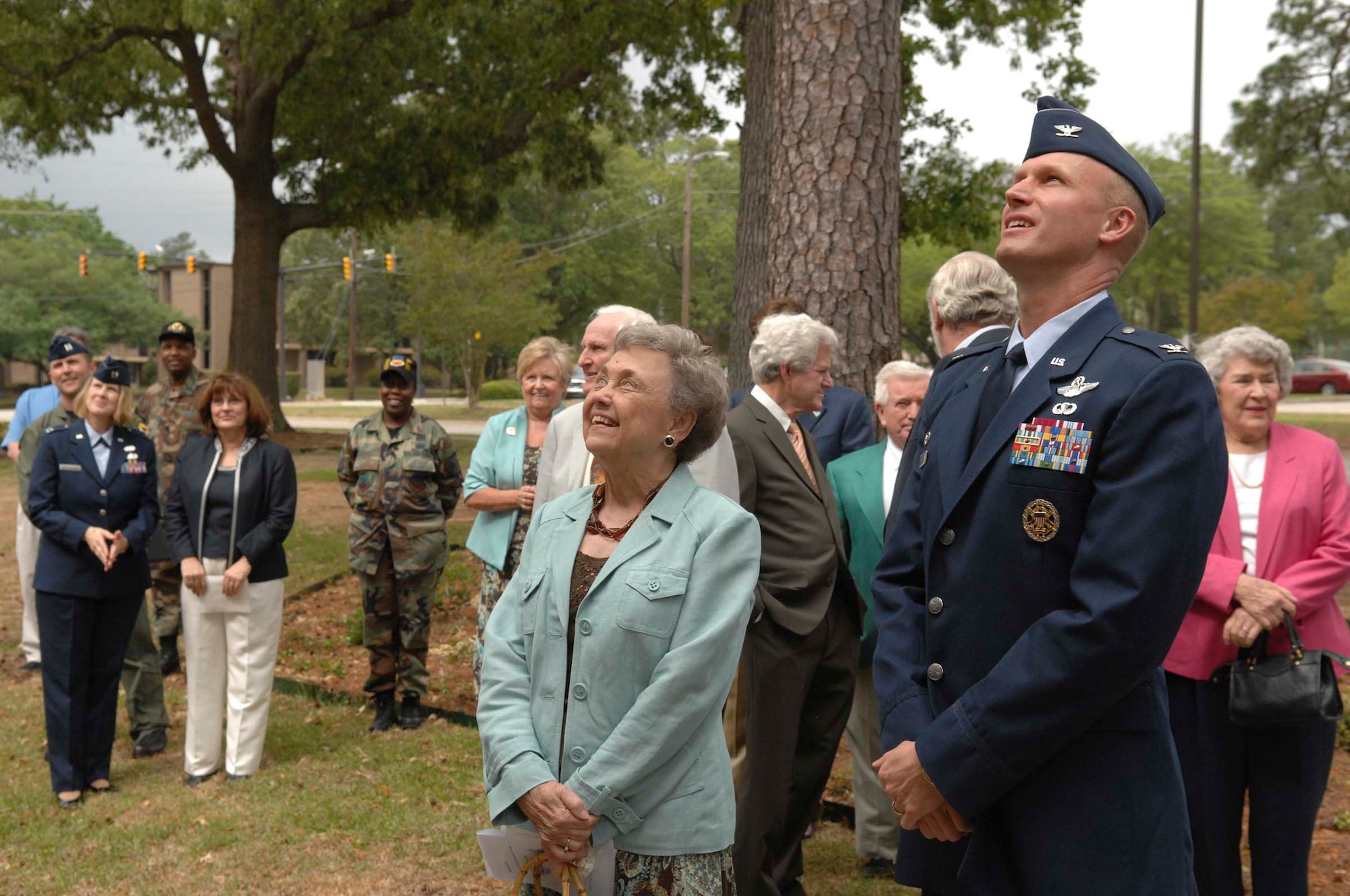 SHAW AIR FORCE BASE, S.C. -- Barbara McElveen, widow of W. Ashby "Mayor Bubba" McElveen Jr., and Col. James Post, 20th Fighter Wing commander, watch the unveiling of the McElveen library at the dedication ceremony April 27. Shaw dedicated its new, state-of-the-art library in memory of "Mayor Bubba," well-known former mayor of Sumter.       