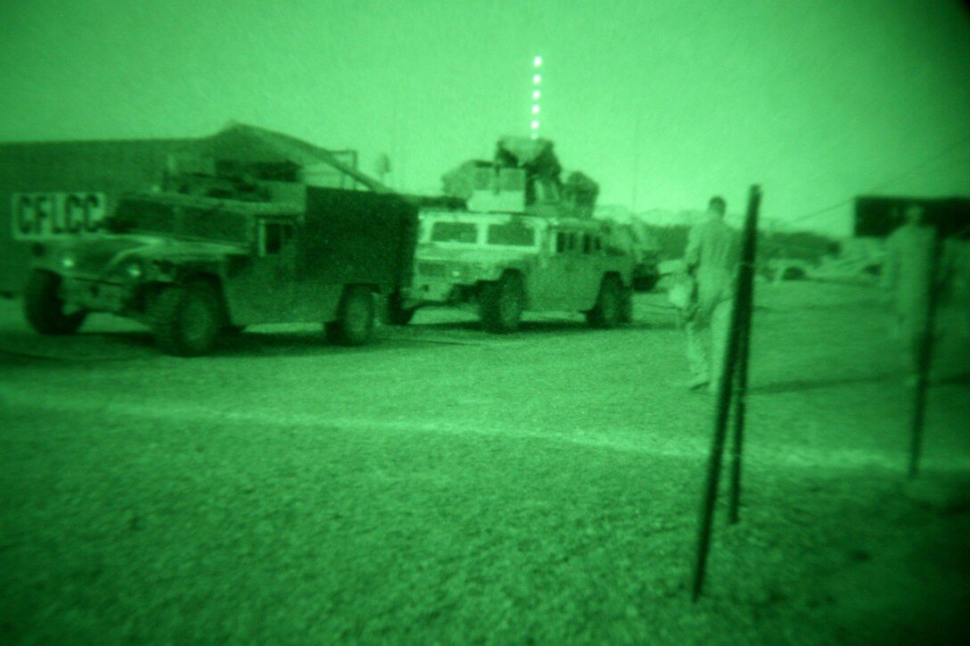 Marines with Company G, 2nd Battalion, 6th Marine Regiment, Regimental Combat Team 6, meet together aboard Forward Operating Base Reaper, located outside the city of Fallujah, before the commencement of a census patrol through the streets on May 10. Company G Marines routinely conduct census patrols from house to house to gather insurgent intelligence and basic information about each family in the area.