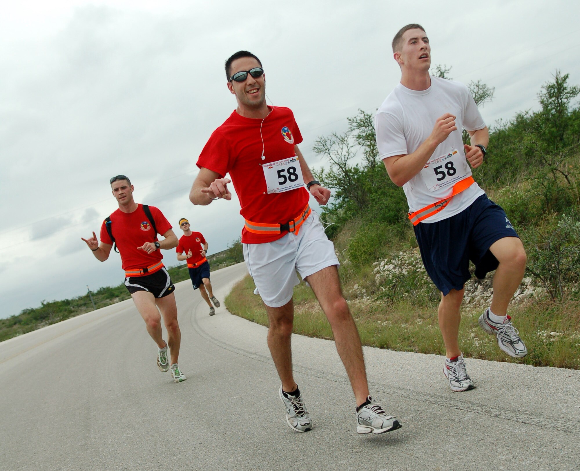 LAUGHLIN AIR FORCE BASE, Texas -- Da Bulls, 87th Flying Training Squadron, run as fast as they can to reach the next portion of the Adventure Race April 28.  Da Bulls placed 3rd overall in the Adventure Race III. (U.S. Air Force photo by Staff Sgt. Austin May)