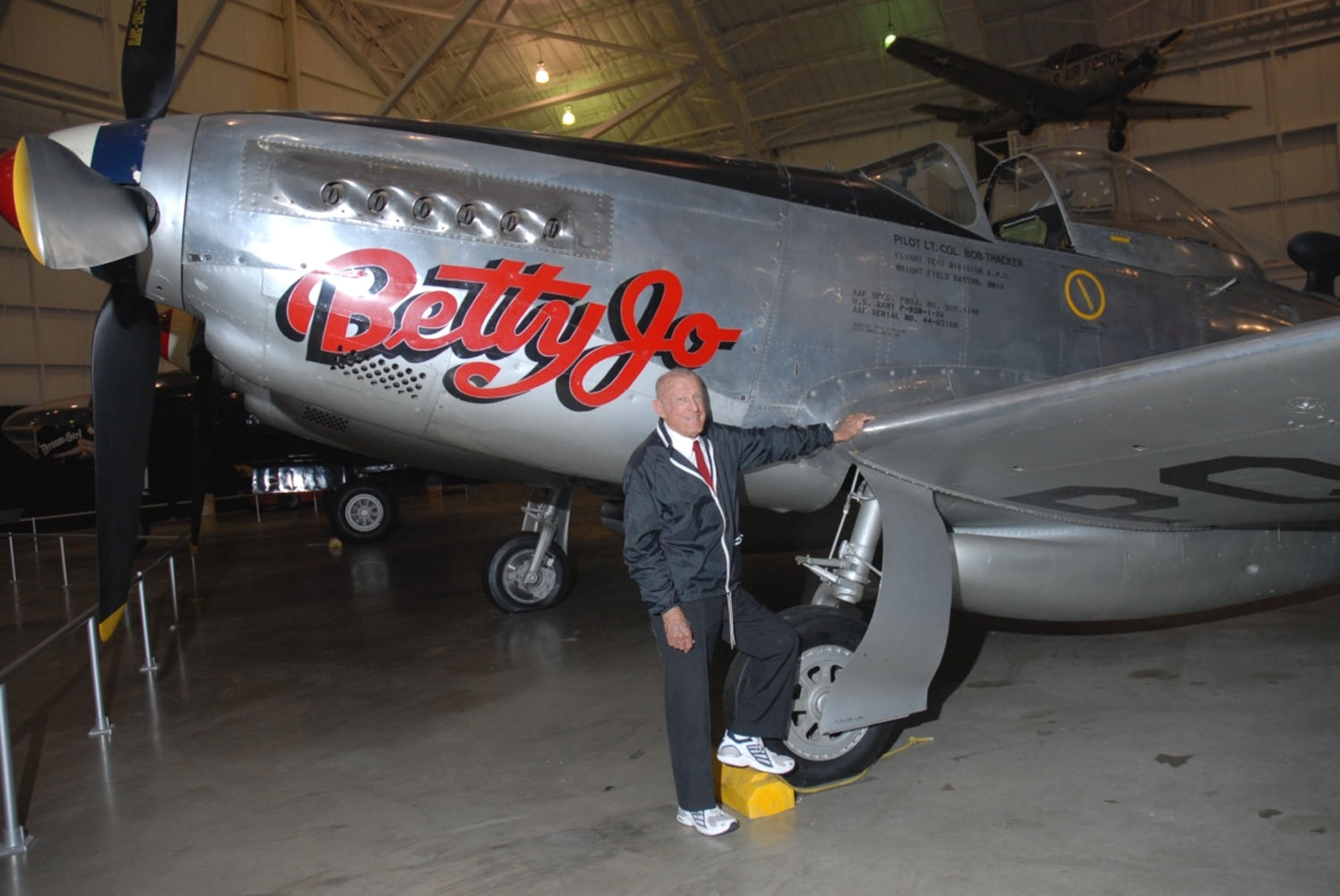 DAYTON, Ohio -- Col. Bob Thacker stands beside the North American F-82B Twin Mustang at the National Museum of the United States Air Force. The museum's F-82B, "Betty-Jo," flew from Hawaii to New York on Feb. 27-28, 1947, a distance of 5,051 miles, the longest non-stop flight ever made by a propeller-driven fighter. (U.S. Air Force photo)
