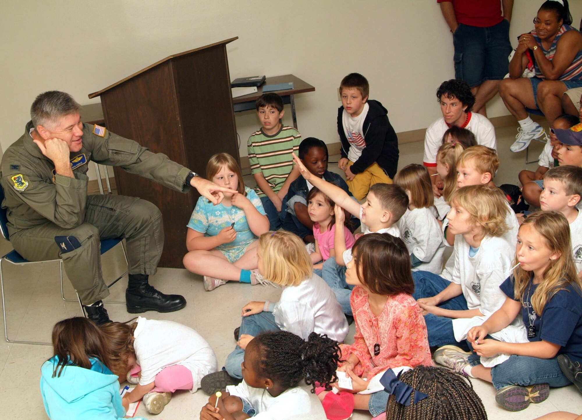 Col. Richard Pierce, 81st Training Wing vice commander, answers “deployment” questions after his welcome briefing to families of deployed members Saturday during Operation Hero, sponsored by the airman and family readiness center. (U. S. Air Force photo by Adam Bond)