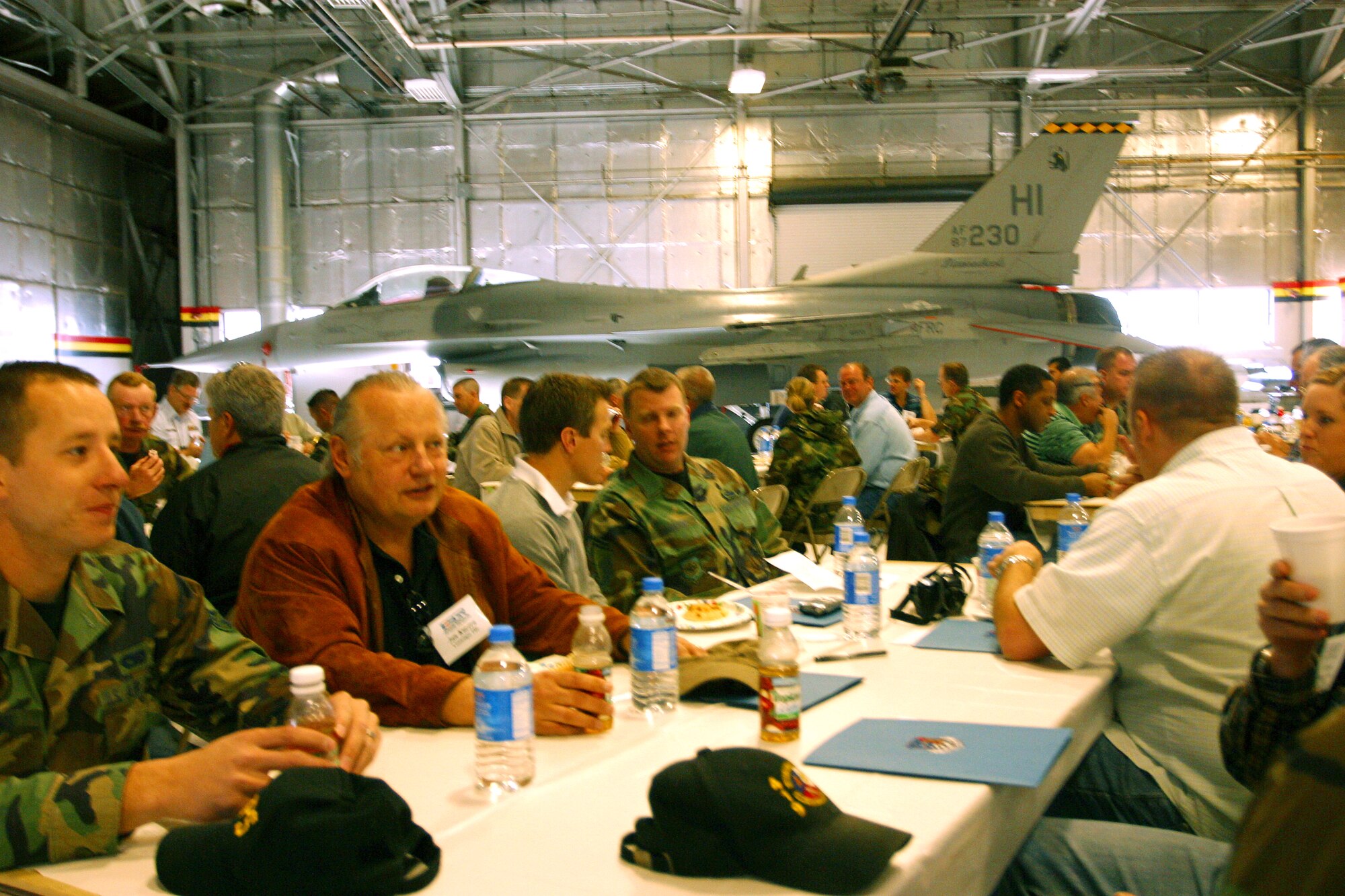 A light continental breakfast, then its off to the tanker! 419th Fighter Wing reservists and their civilian employers eat a light meal before the employers are treated to a show of a mid-air refueling flight. Photo by Senior Airman Daniel Durbin.
