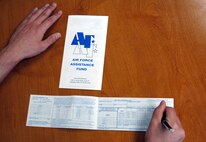 MINOT AIR FORCE BASE, N.D. -- People can contribute to the Air Force Assistance Fund campaign until May 6. AFAF contributions help the Air Force Village Foundation, the Air Force Aid Society, the General and Mrs. Curtis E. LeMay Foundation and the Air Force Enlisted Village. Organizations like this help Airmen with financial aid in emergency situations, secure retirement homes for widows or widowers of Air Force members and more. (U.S. Air Force photo by Senior Airman Danny Monahan)