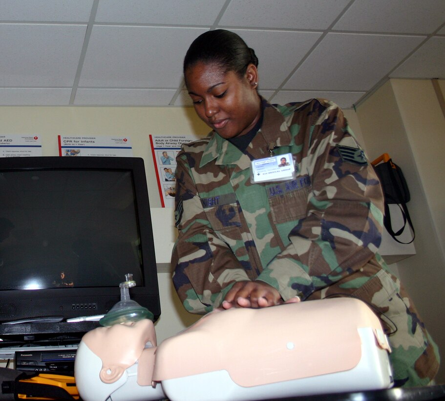 Staff Sgt. Ebony Knight, director of the Life Support program for the 82nd Medical Group, demonstrates CPR chest compressions during a HeartSaver/AED class. (U.S. Air Force photo/Staff Sgt. Tonnette Thompson)