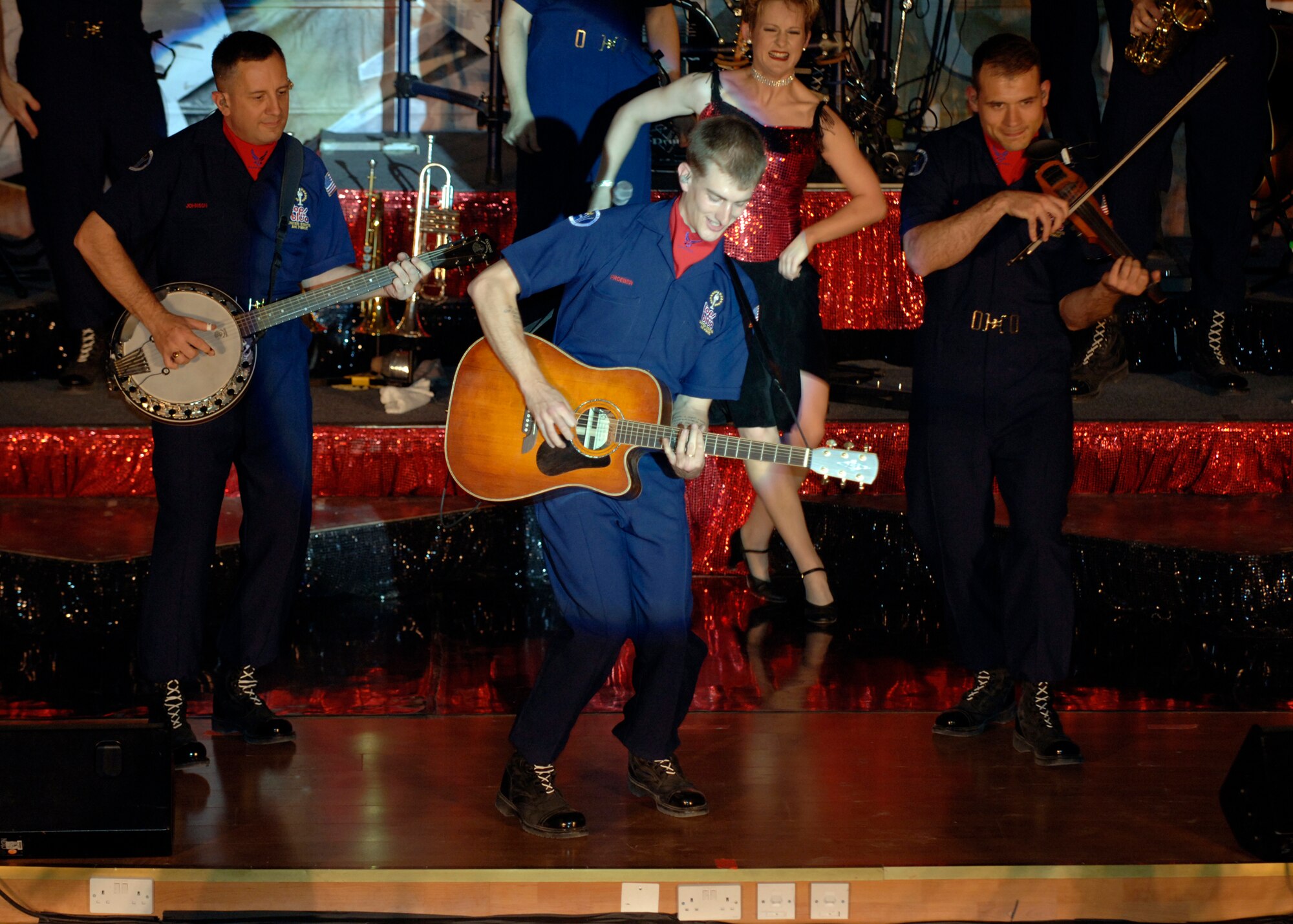 The Tops in Blue crew performs for the members of the 386th Air Expeditionary Wing on Wednesday, 2 May 2007, at an undisclosed location in Southwest Asia.  Known as the Air Force's Expeditionary Entertainers; the group's main mission is to perform for military personnel and their families throughout the world. (USAF photo by TSgt Edward D. Holzapfel) RELEASED