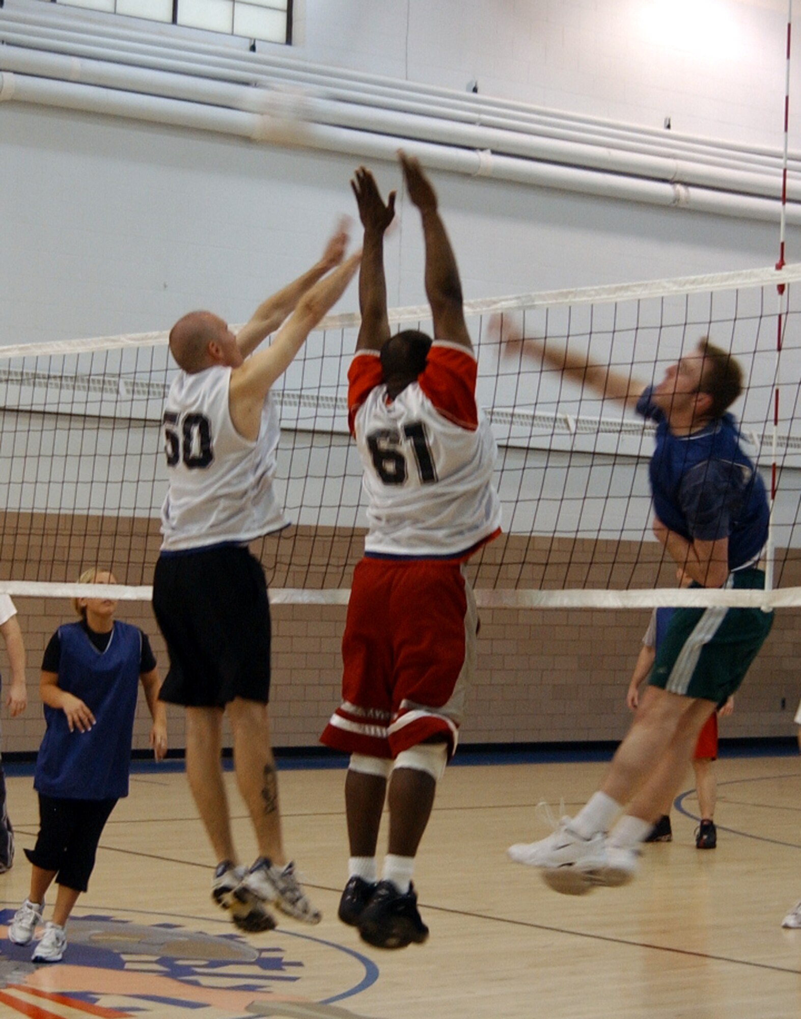 GRAND FORKS AIR FORCE BASE, N.D. ? Mission Support Squadron? Robert Mummert spikes the ball during the intramural volleyball championship April 30. MSS beat the 319th Logistics Readiness Squadron team A two games to one. (U.S. Air Force photo/Senior Airman J. Paul Croxon)