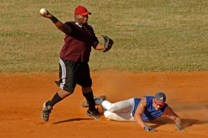 Senior Airman Tamir Brooks Maintenance Operations Squadron tags out Senior Airman David Hardy of 437th Maintenance Squadron 1. (U.S. Air Force photo/Staff Sgt. April Quintanilla)