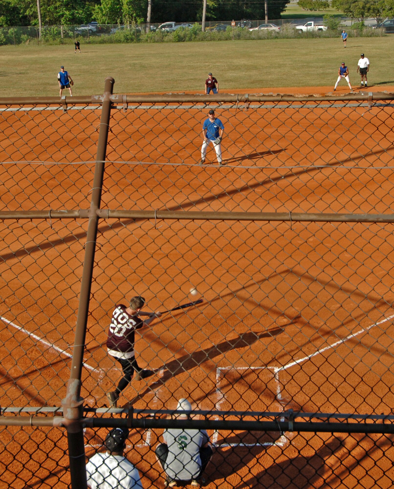 Staff Sgt. Joseph Sparlin 437th Maintenance Operations Squadron slams the ball to Maintenance Squadron 1 outfield allowing MOS to score. (U.S. Air Force photo/Staff Sgt. April Quintanilla)