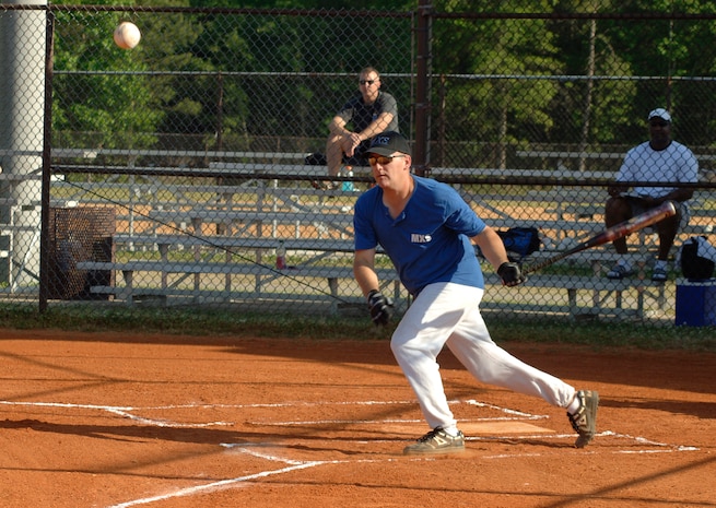 Tech. Sgt. Randall Bitler Maintenance Squadron 1 connects with the ball, which allows for a base hit.  (U.S. Air Force photo/Staff Sgt. April Quintanilla)