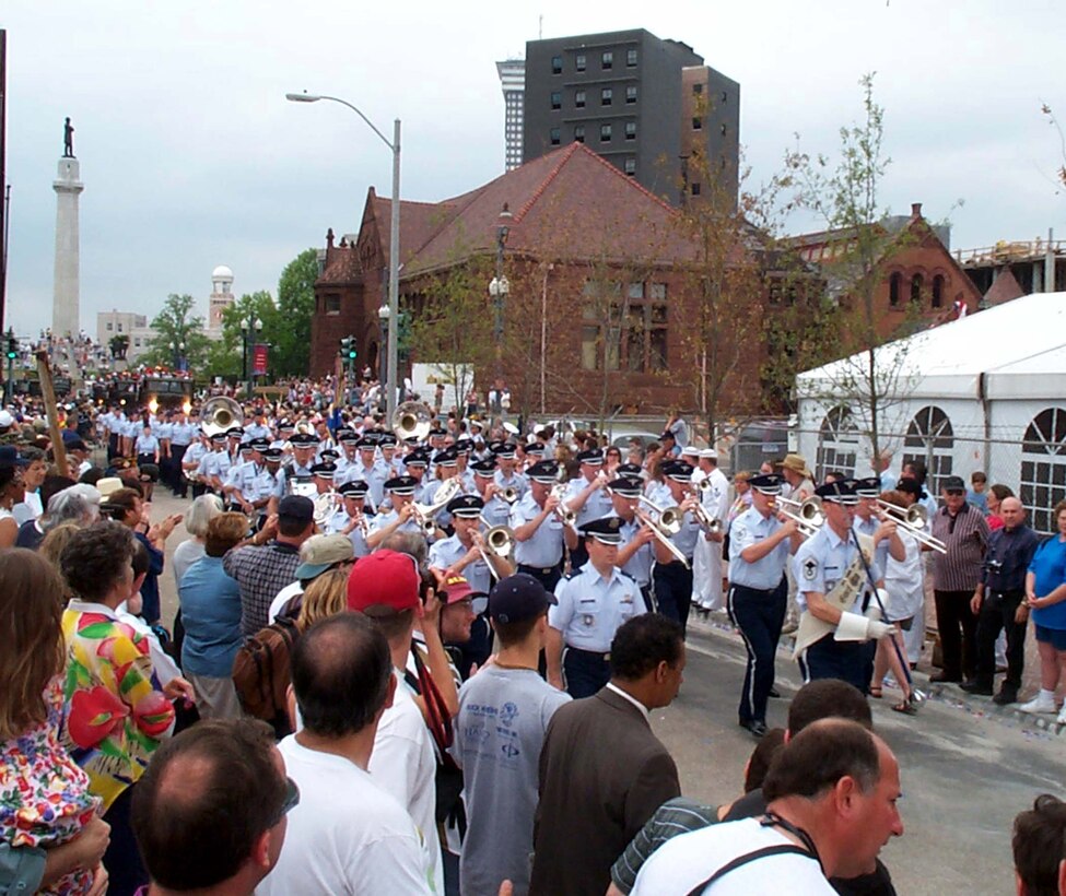The Air Force Band of the Rockies marches past the National D-Day Museum in New Orleans during dedication ceremonies. The band was just one of many DoD units that participated in the June 6 military parade. In addition to the military parade, there was a military flyover and naval ship visits. Photo by Jim Garamone. 