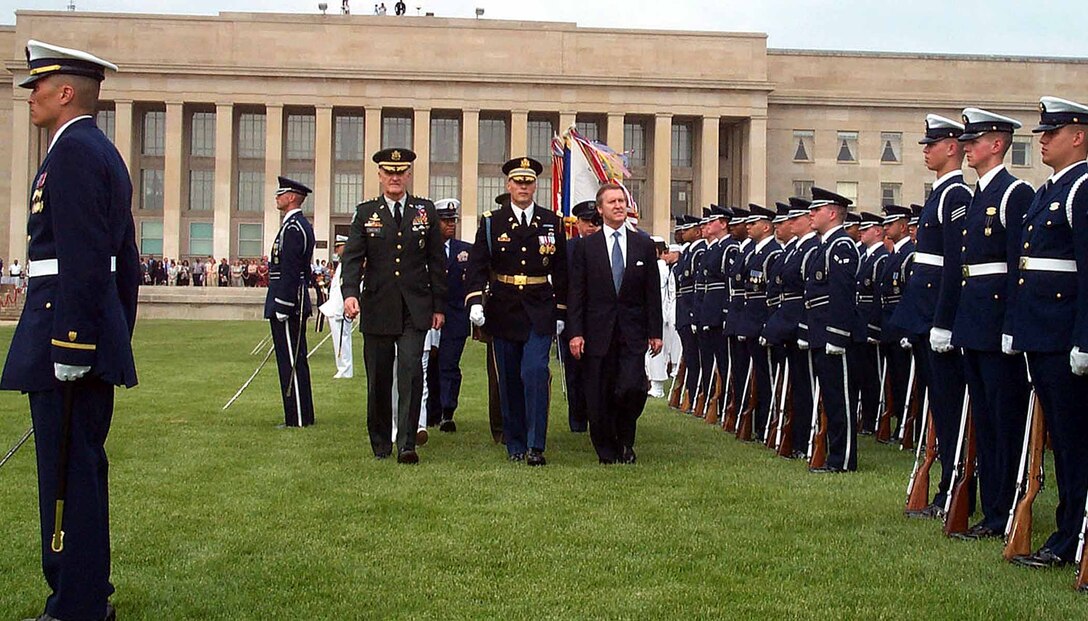 Escorted by a member of the 3rd Infantry Division Honor Guard, Chairman ...