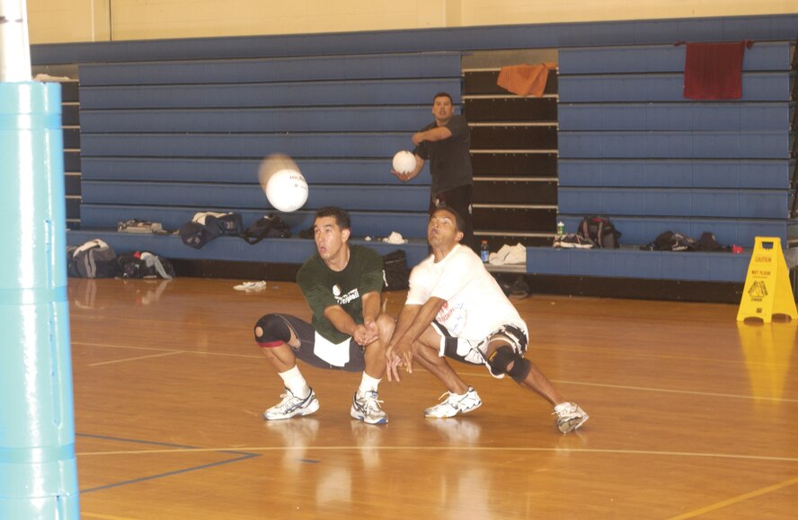 Kal Kahele and Miguel Vallejo form a defensive duo during scrimmage Sunday. Kahele, assigned to the 204th Airlift Squadron, Hawaii Air National Guard, and Vallejo, 324th Information Squadron, are two of four team Hickam members to make the Air Force Team
