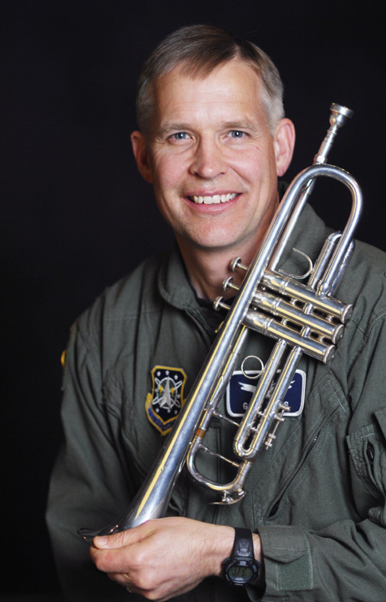 Col. Gary Wirsig, 30th SW chief of safety, plays trumpet as a creative outlet as well as in church and at the Retreat & Reville ceremony at the 30th Space Wing headquarters building April 18. (Photo by Staff Sgt. Denoris Mickle)