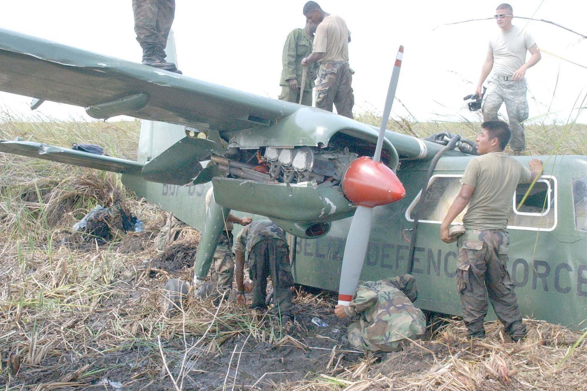 BELIZE CITY, BELIZE -- Joint Task Force-Bravo Soldiers were called on to slingload a BN-2B Defender aircraft that was caught in the marshes near the coast of Belize. The aircraft was successfully removed and delivered to the BDF air station at Belize City International Airport. (U.S. Air Force photo by Staff Sgt. Chyenne A. Griffin)               