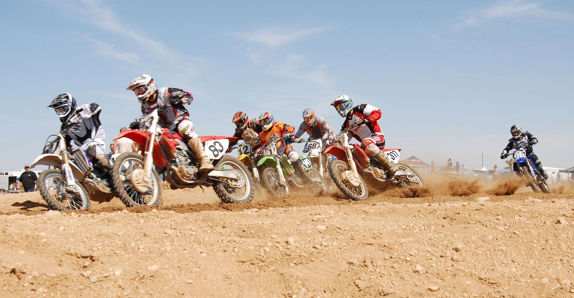 Motocross enthusiasts race at Edwards' dirt track during the Dunestown Motocross race April 29. The Desert Wheels and California Racing Clubs hosted the event. (Photo by Senior Airman Jason Hernandez)