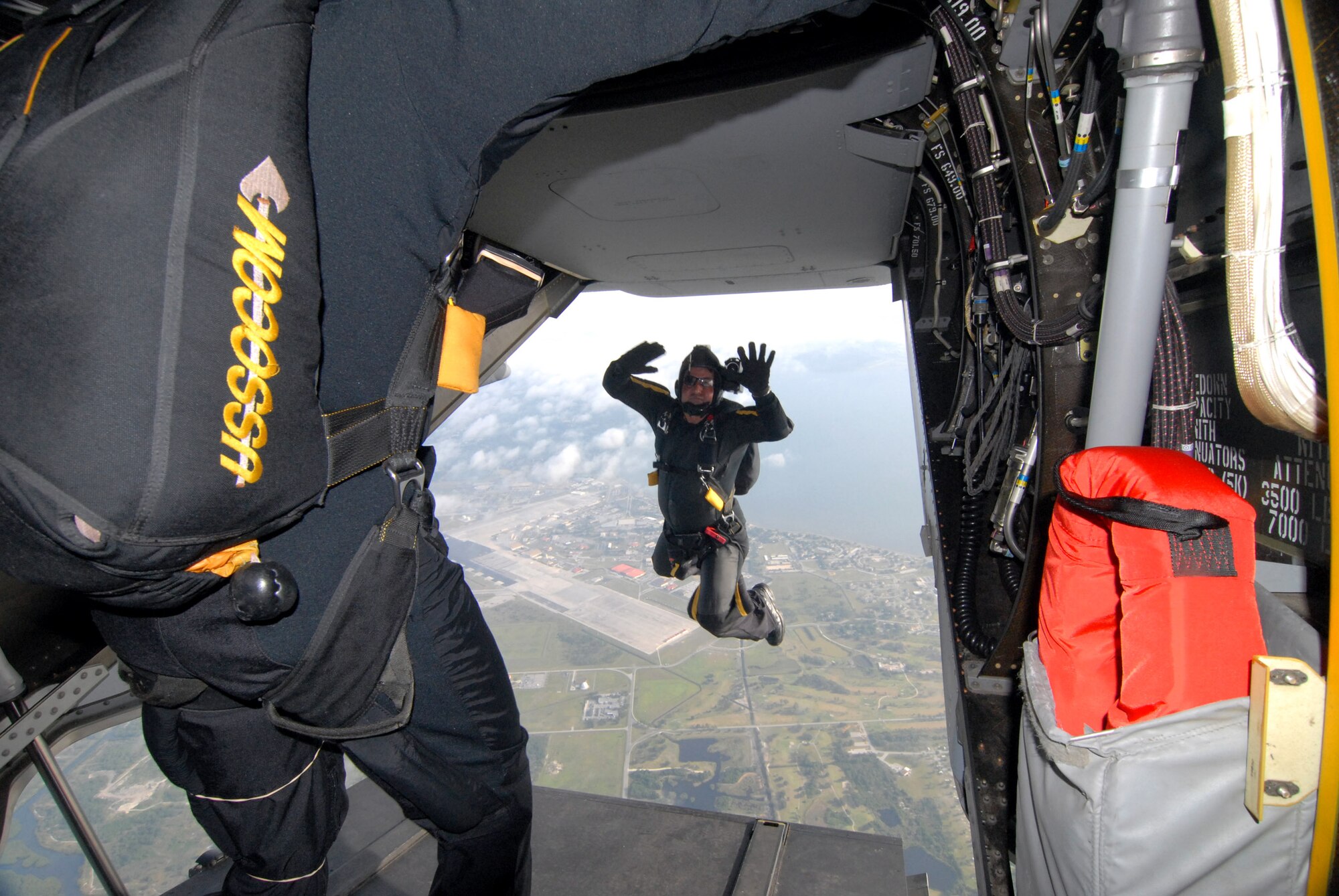 Andy Serano, a member of the U.S. Special Operations Command parachute team, jumps from a CV-22 Osprey over MacDill Air Force Base, Fla., April 27.  The Osprey is from Air Force Special Operations Command's 8th Special Operations Squadron at Hurlburt Field, Fla. (Department of Defense photo/Mike Bottoms) 