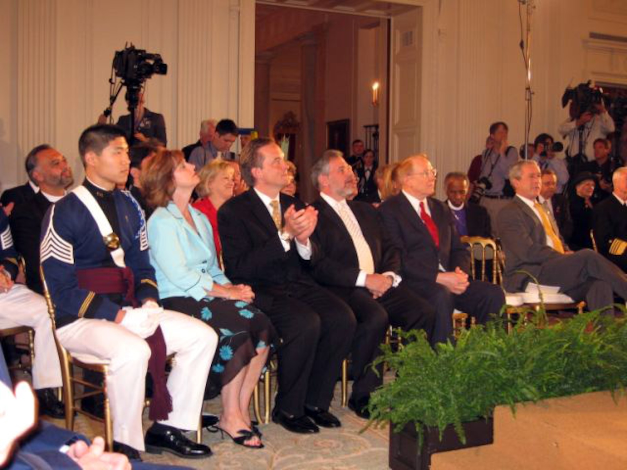 Virginia Tech Cadet Houston Yu (far left) sits near President George W. Bush as they listen to the ceremony opening remarks of the National Day of Prayer May 3 at the White House in Washington, D.C. Cadet Yu was one of five speakers at the ceremony. The cadet is a member of the Virginia Tech Air Force ROTC.(Courtesy photo)
